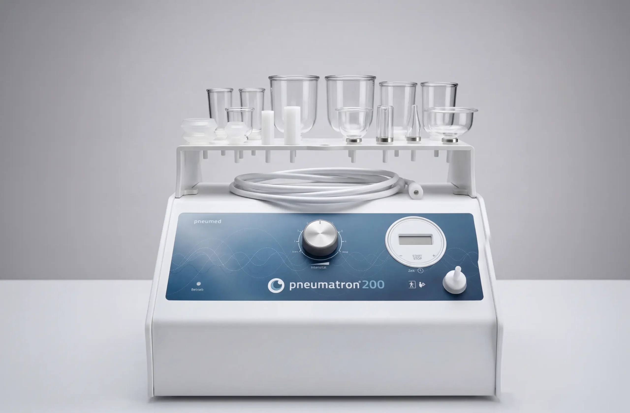 naprava Pneumatron 200 z različnimi nastavki za pnevmatsko pulzacijsko terapijo